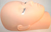 Training mannequin head in laying down position