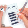 GladGirl Lash Box in use - removing lashes form palette with tweezers