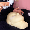 Lash artist using Training Mannequin Head