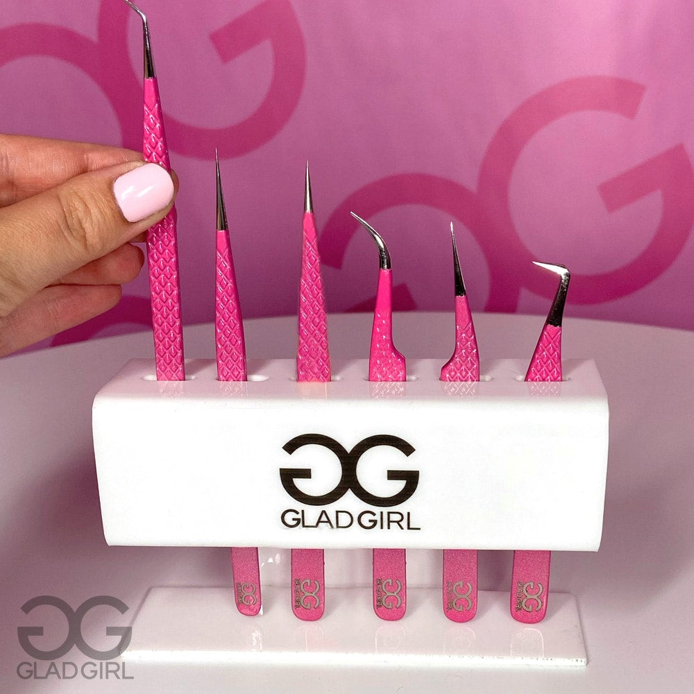Removing pink tweezers from GladGirl Tweezer Stand
